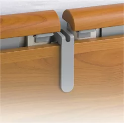 Držák na přílušenství k lůžku