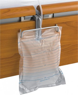 Držiak močového vrecka k lôžku